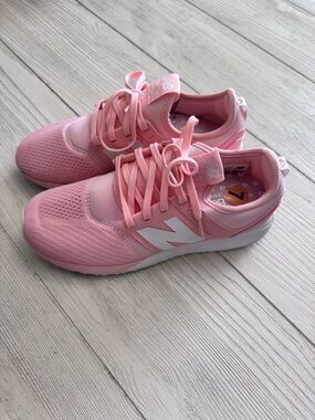 New Balance Pink and White womens Athletic Sneakers